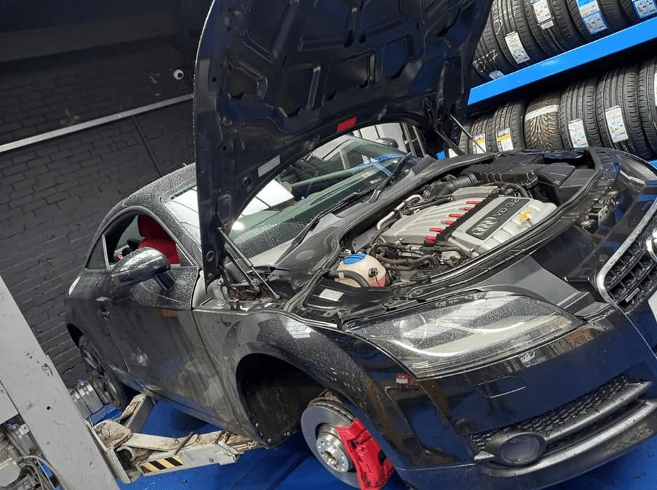 Mechanic working on a car
